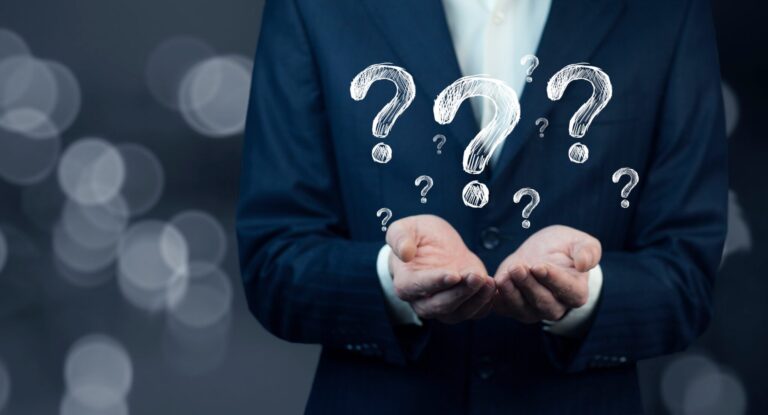 Businessman hand hold interface question marks Businessman hand hold interface question marks